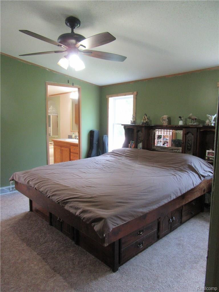7164 Gardner Line Road Lexington, MI 48450 - Photo 25 of 31 master bedroom