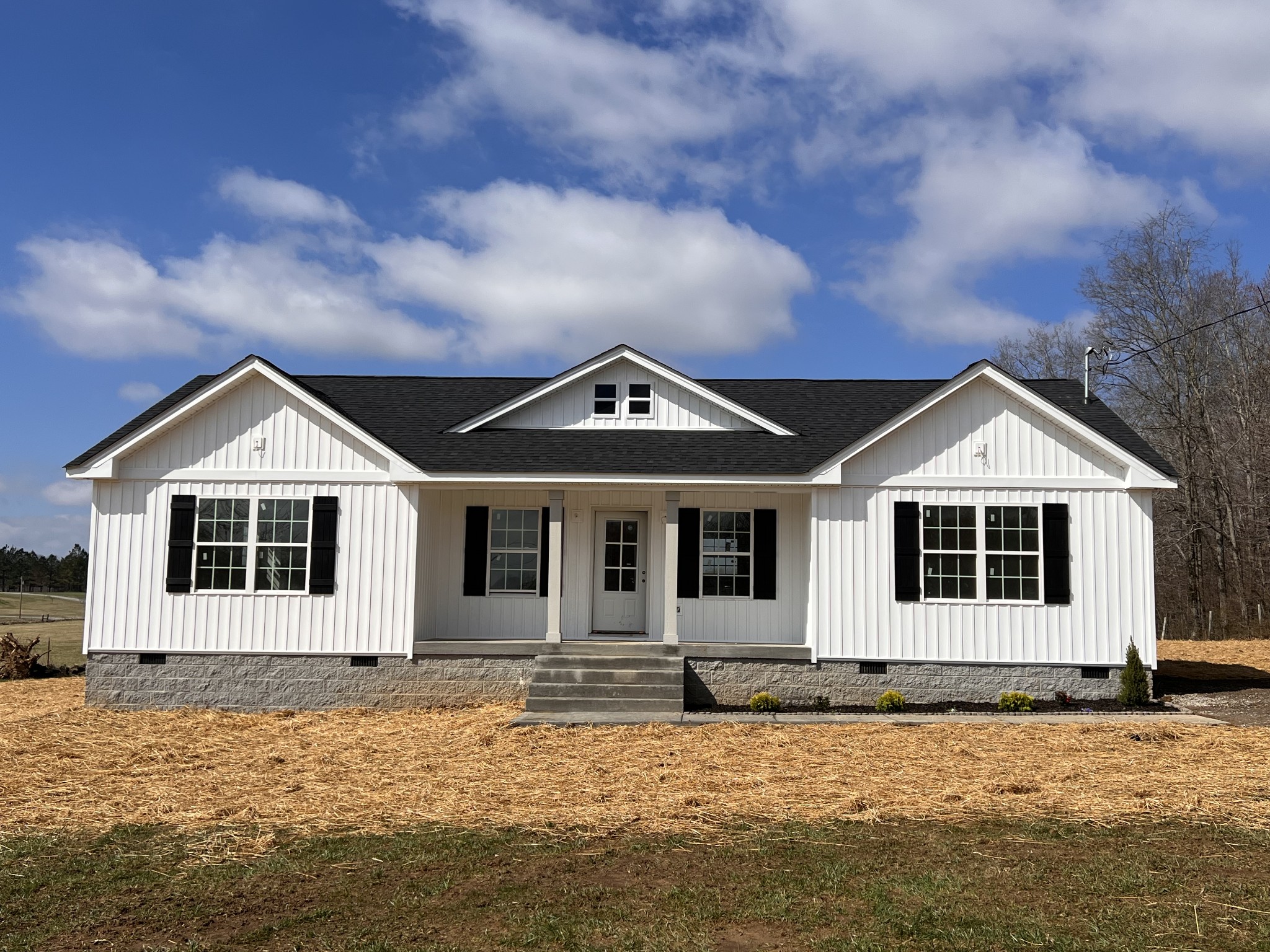 1364 Lecomte Road Dickson, TN 37055 - Photo 1 of 4 a front view of a house with a yard
