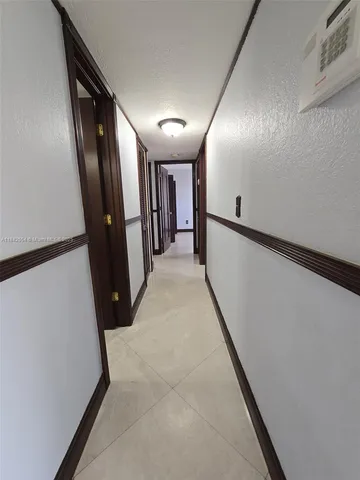 a view of hallway with stairs