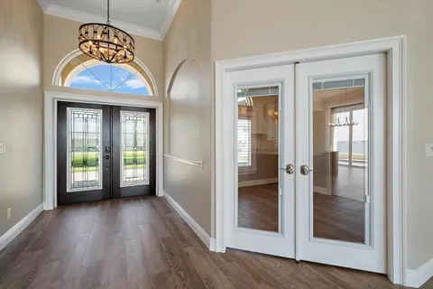 a kitchen with granite countertop a stove and a sink