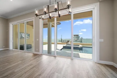 a spacious bathroom with a bathtub sink and mirror