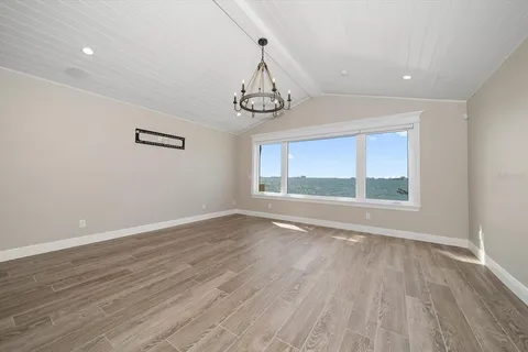 a view of livingroom with hardwood floor and ceiling fan