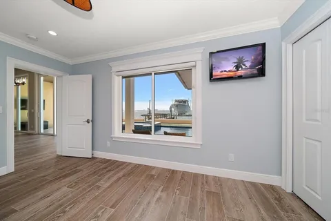 a view of a swimming pool with a yard