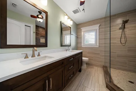 a stove top oven sitting inside of a kitchen