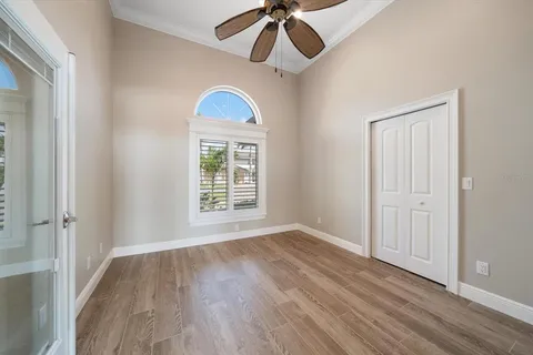 an aerial view of a house with a lake view