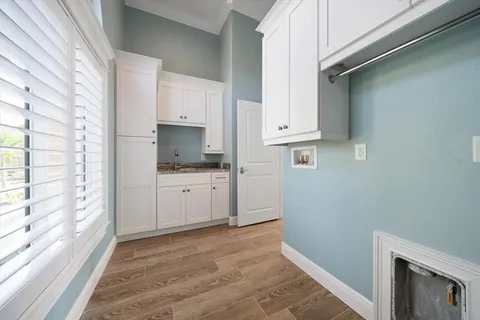 an aerial view of a house with a lake view