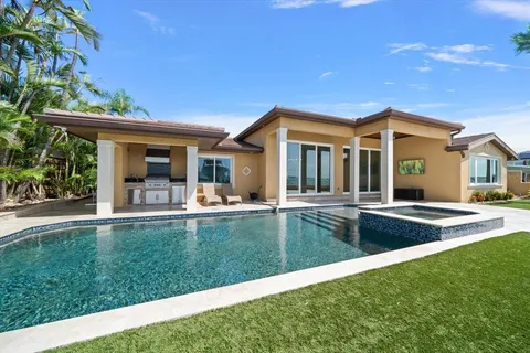 a view of swimming pool with patio