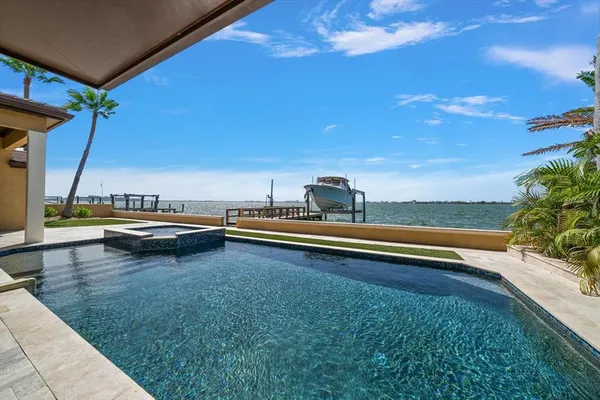 a view of a house with a swimming pool