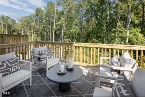a view of a patio with furniture