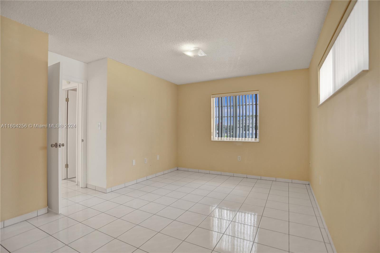 3131 West 79th Place Hialeah, FL 33018 - Photo 29 of 38 a view of an empty room with window