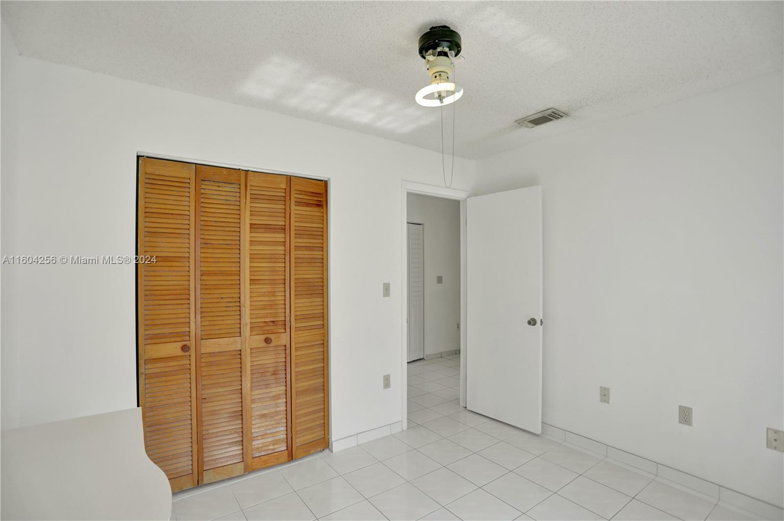 3131 West 79th Place Hialeah, FL 33018 - Photo 35 of 38 a view of an empty room