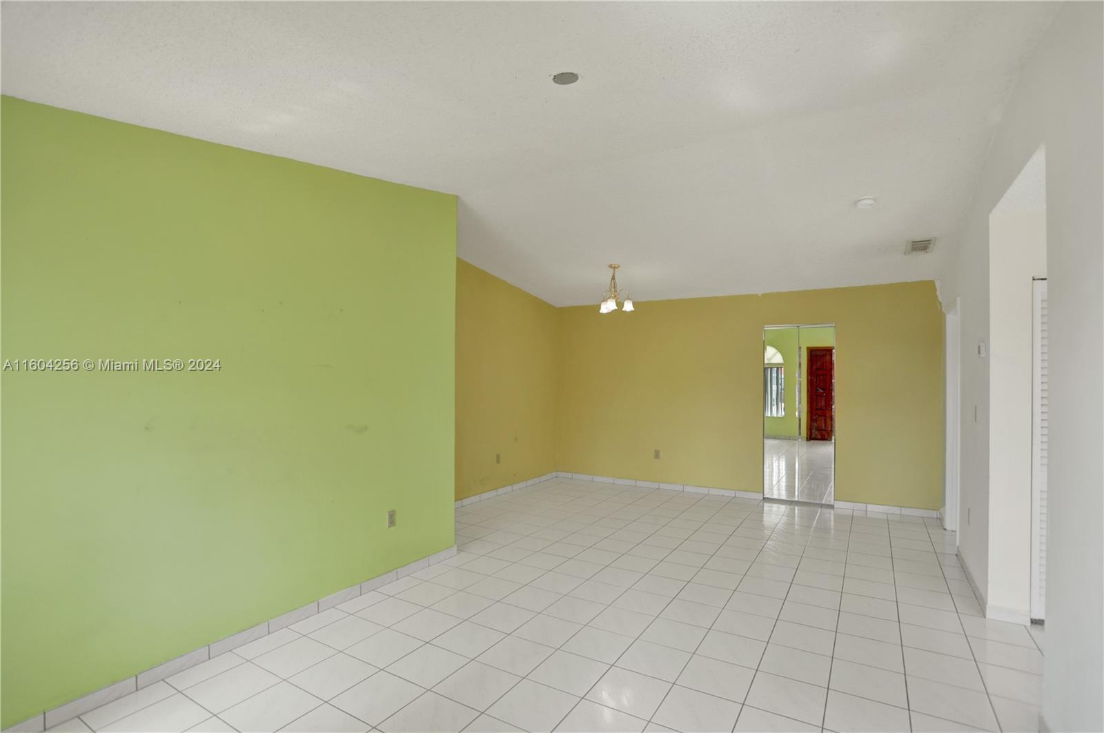 3131 West 79th Place Hialeah, FL 33018 - Photo 4 of 38 a view of a big room with wooden floor