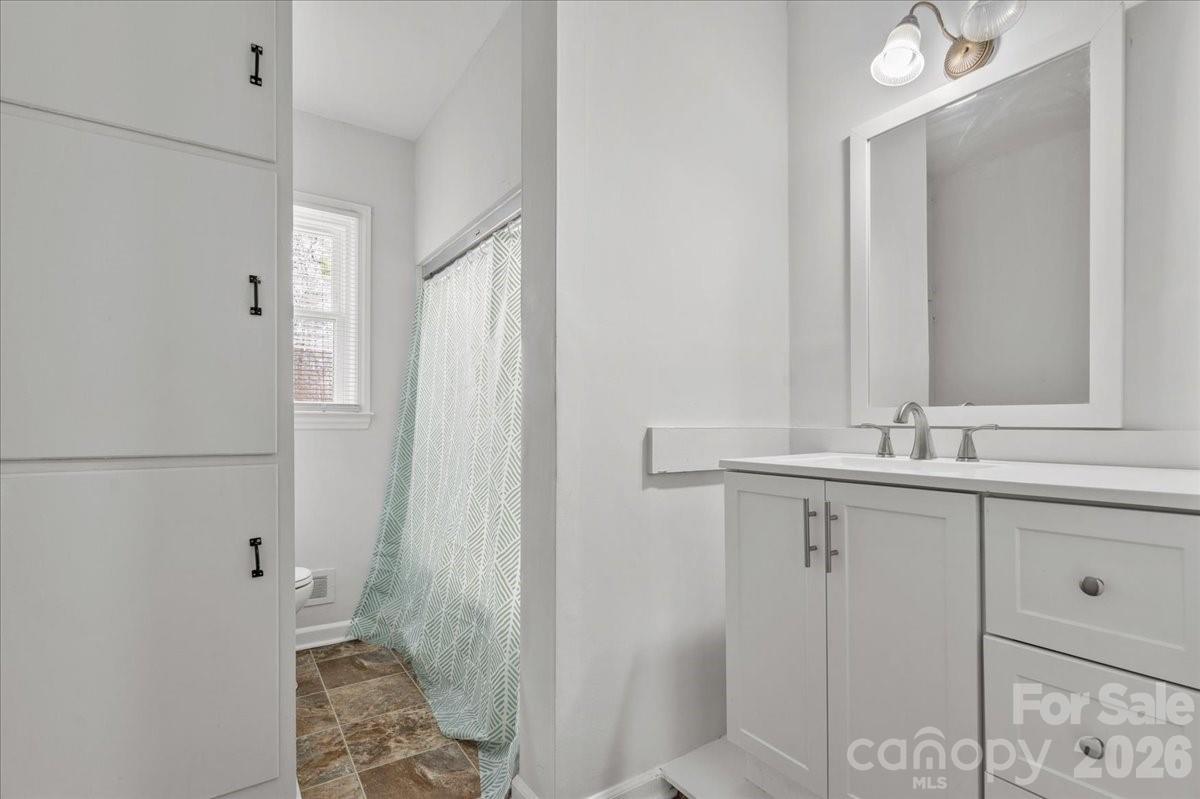 2541 Highway 145 Chesterfield, SC 29709 - Photo 16 of 47 a bathroom with a sink and a mirror