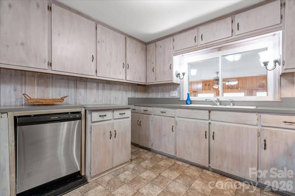 2541 Highway 145 Chesterfield, SC 29709 - Photo 31 of 47 a kitchen with granite countertop white cabinets and white appliances