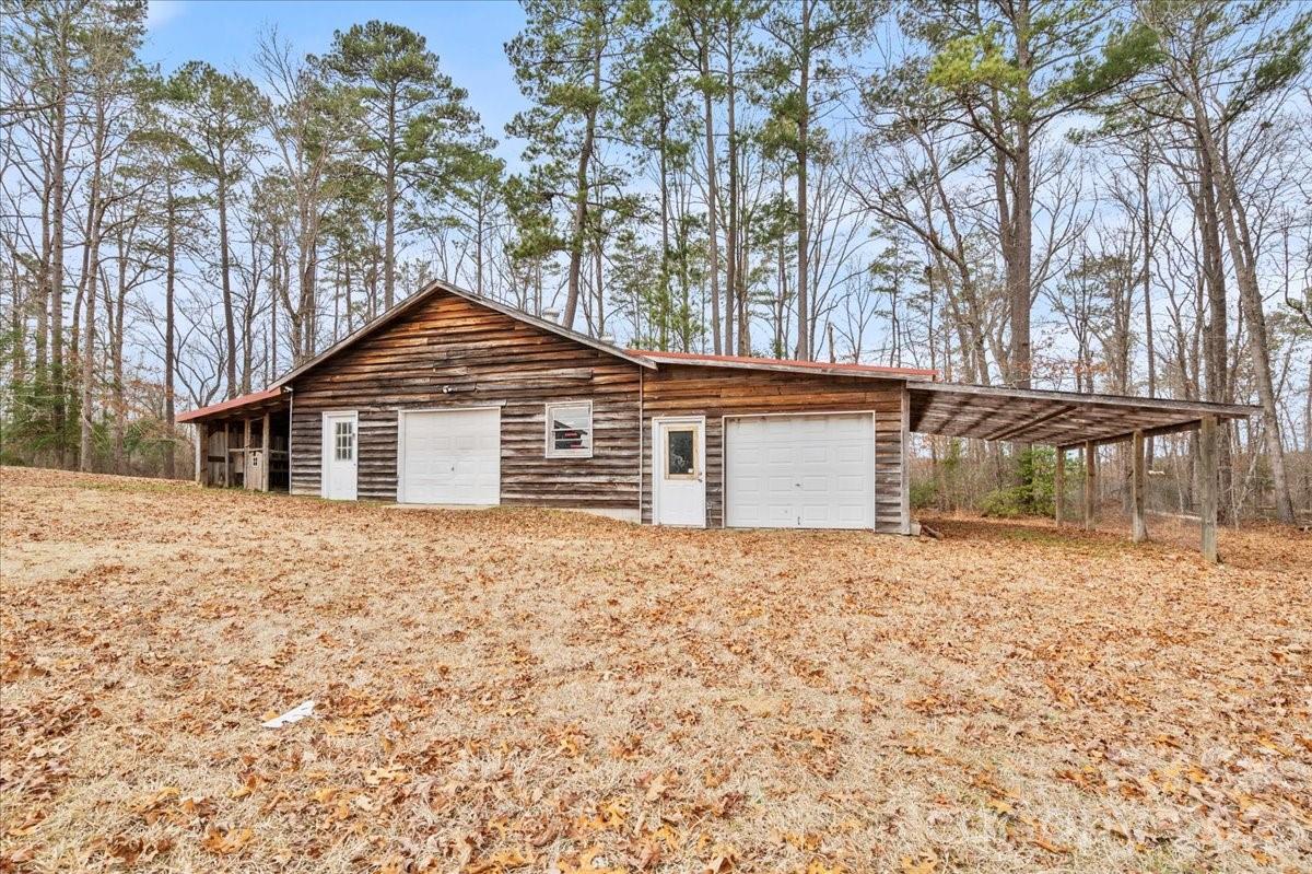 2541 Highway 145 Chesterfield, SC 29709 - Photo 38 of 47 a front view of a house with a yard and garage