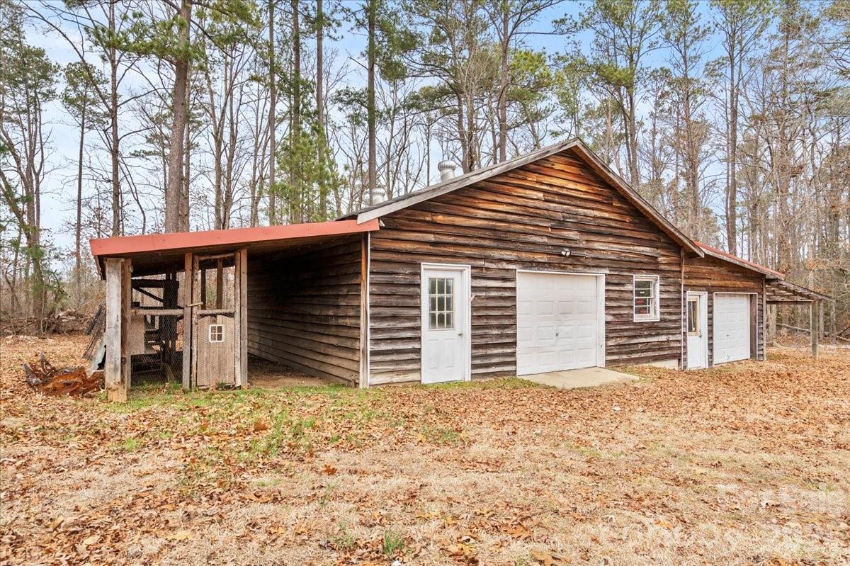 2541 Highway 145 Chesterfield, SC 29709 - Photo 39 of 47 a front view of a house with a yard and garage