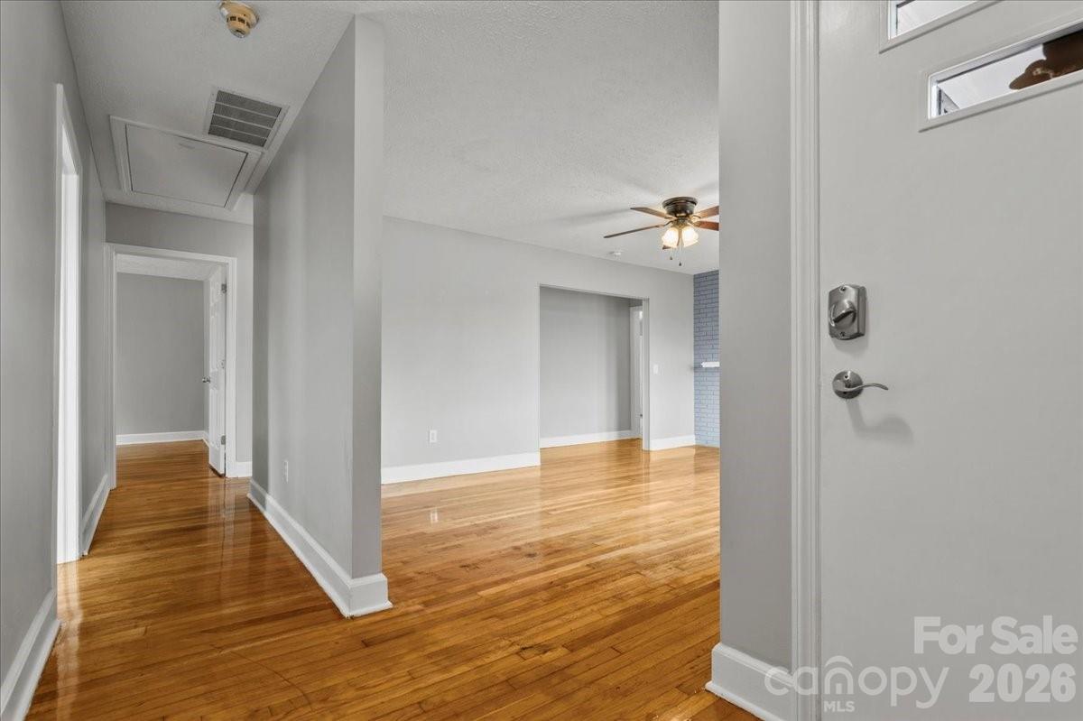 2541 Highway 145 Chesterfield, SC 29709 - Photo 9 of 47 a view of a hallway with wooden floor