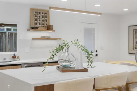 a vase of flowers sitting on a table