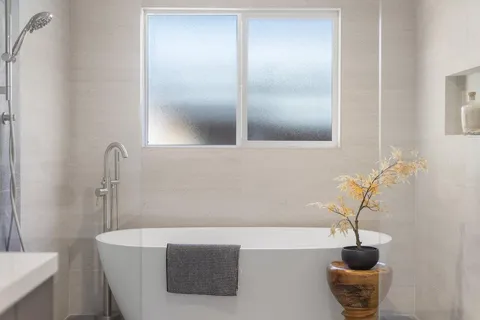 a bathroom with a sink and a bathtub