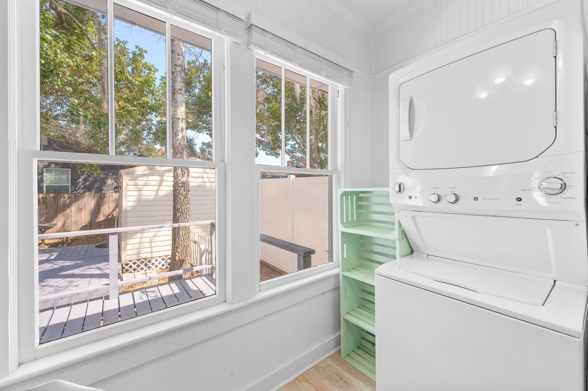 59 Lewis Boulevard St. Augustine, FL 32084 - Photo 20 of 75 Laundry nook featuring stacked washer / dryer and light wood finished floors