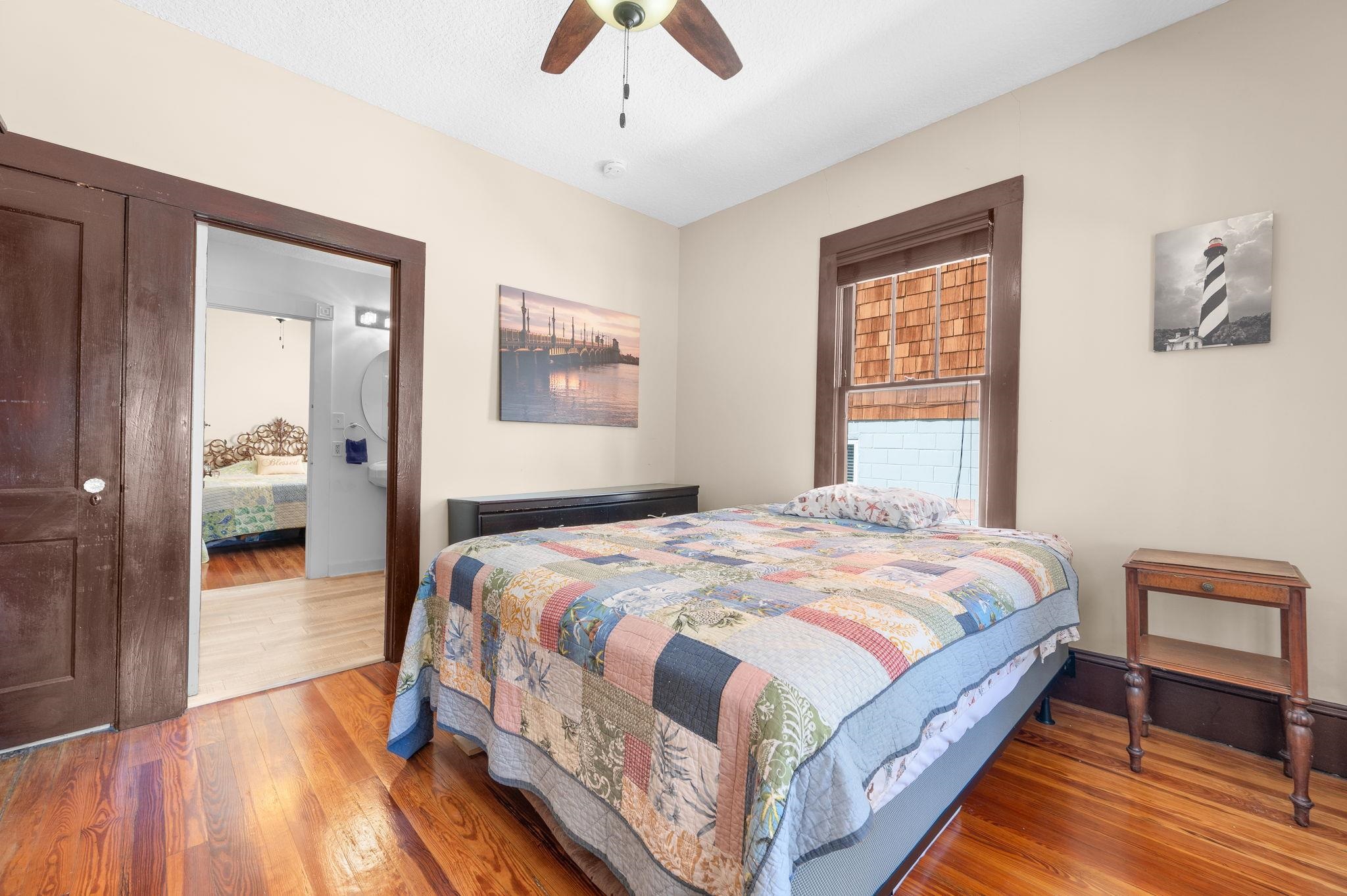 59 Lewis Boulevard St. Augustine, FL 32084 - Photo 25 of 75 Bedroom featuring wood-type flooring and a ceiling fan