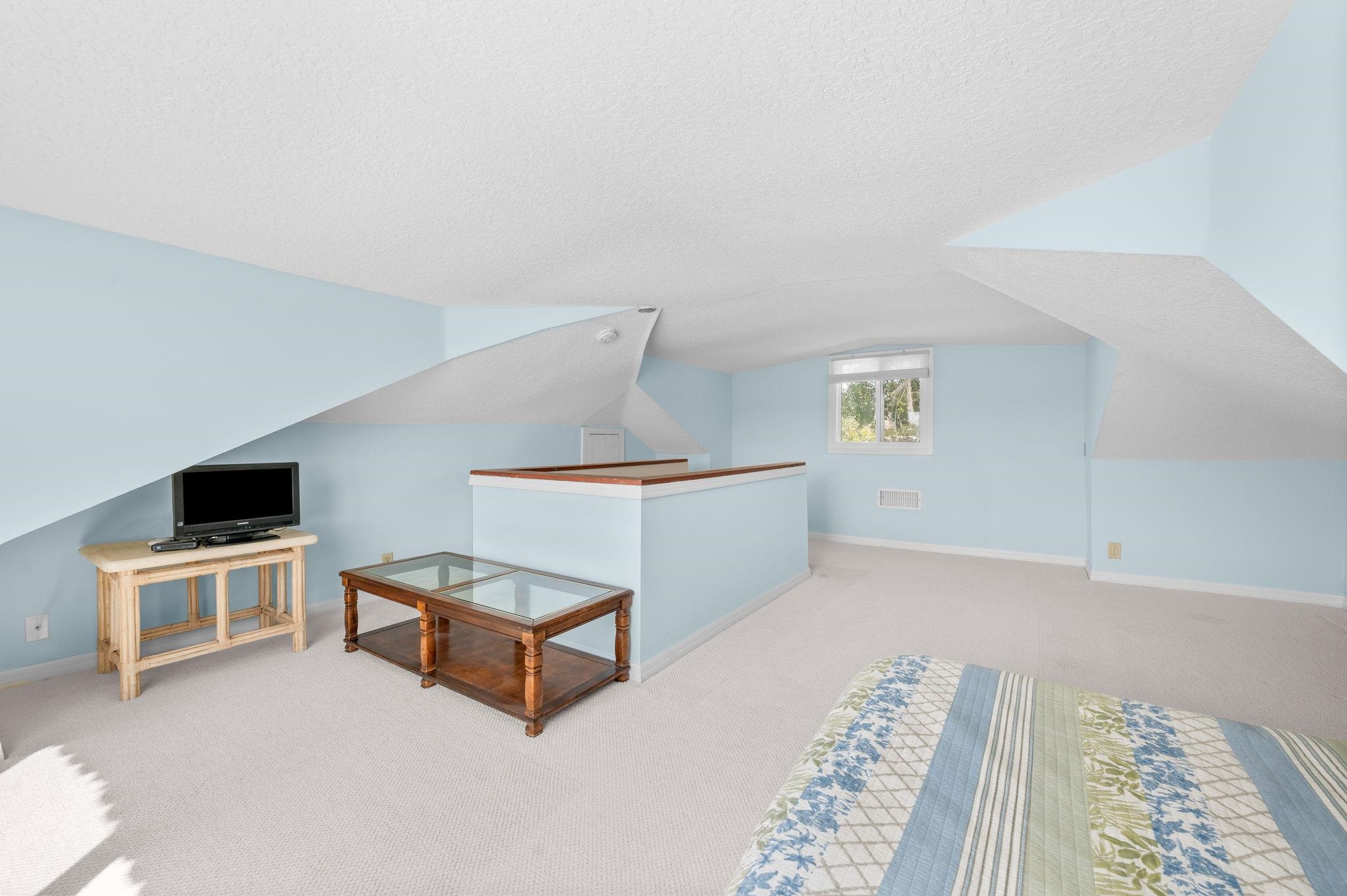 59 Lewis Boulevard St. Augustine, FL 32084 - Photo 28 of 75 Additional living space featuring light carpet and baseboards