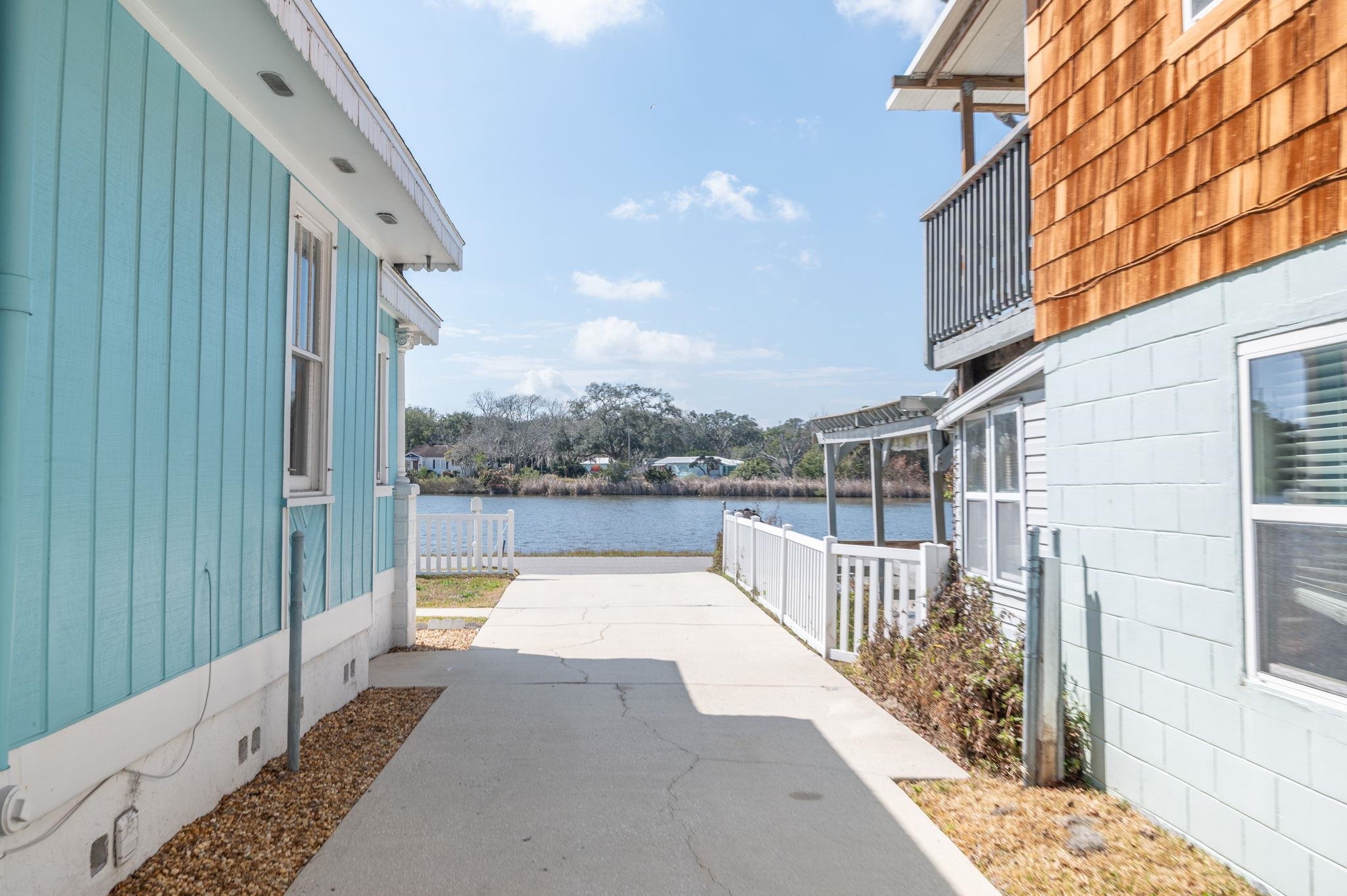 59 Lewis Boulevard St. Augustine, FL 32084 - Photo 37 of 75 Driveway looking south from garage