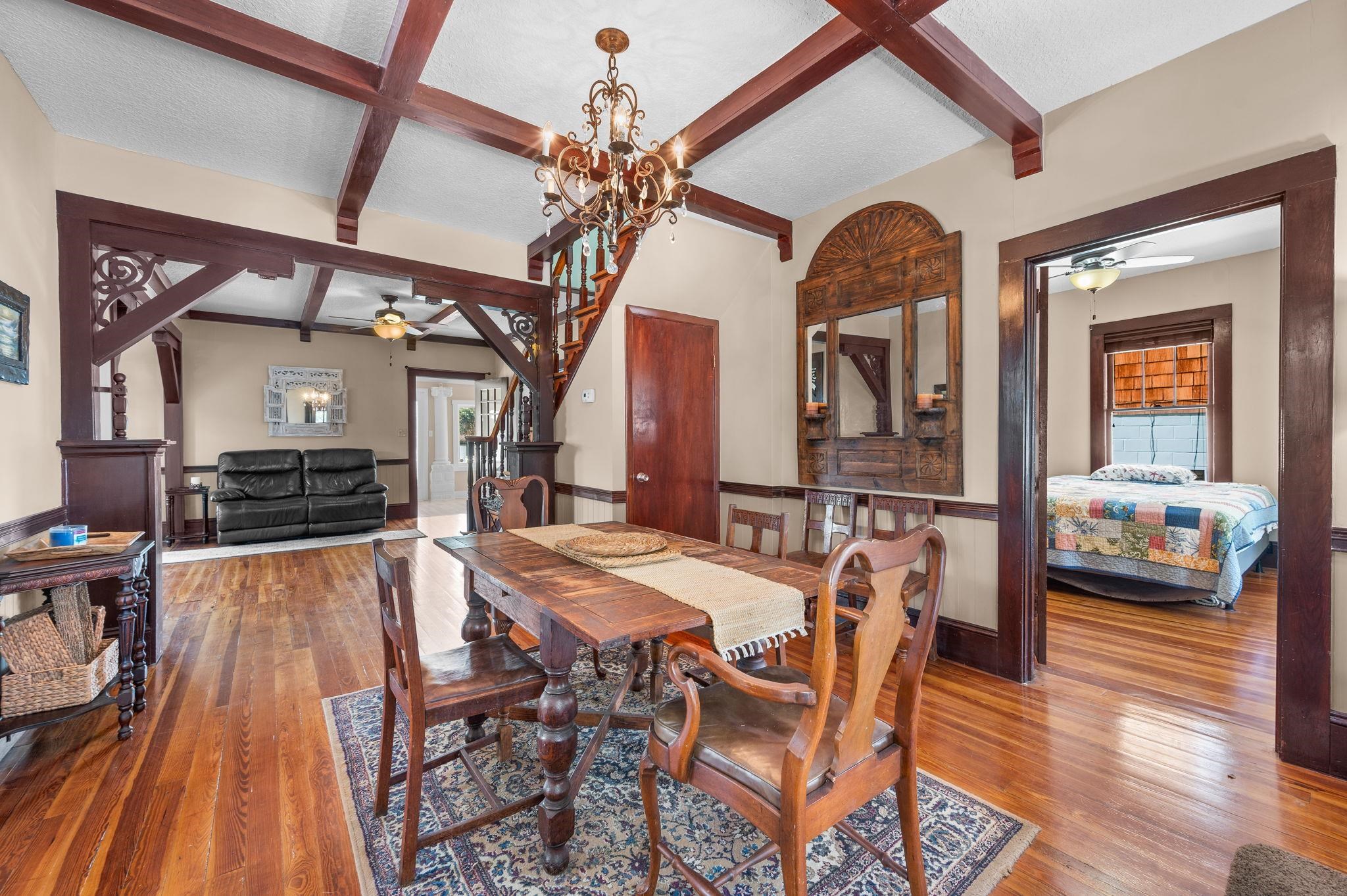 59 Lewis Boulevard St. Augustine, FL 32084 - Photo 71 of 75 Dining room with ceiling fan, hardwood / wood-style floors, coffered ceiling, and a chandelier