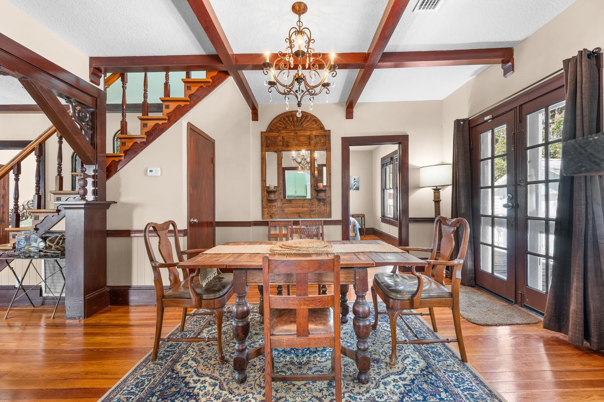 59 Lewis Boulevard St. Augustine, FL 32084 - Photo 73 of 75 Dining room with french doors, suspended lighting, light wood-style flooring, and coffered ceiling