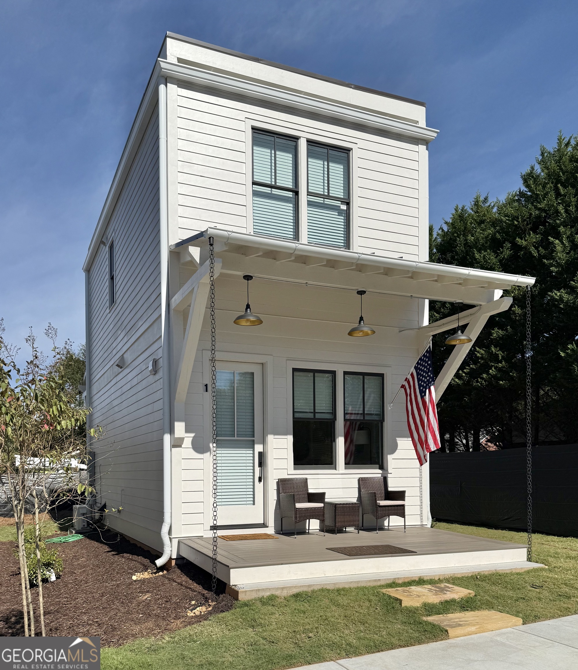 a view of house with outdoor space and porch