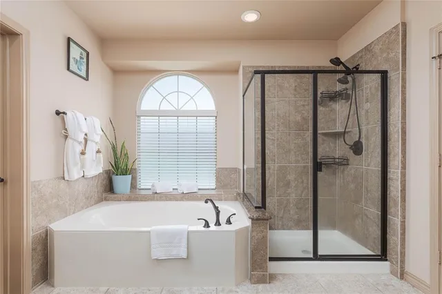 a living room with lots of chairs and a table