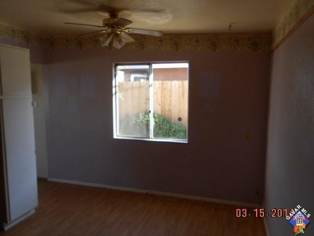 1233 South McCall Street Ridgecrest, CA 93555 - Photo 7 of 8 an empty room with a window