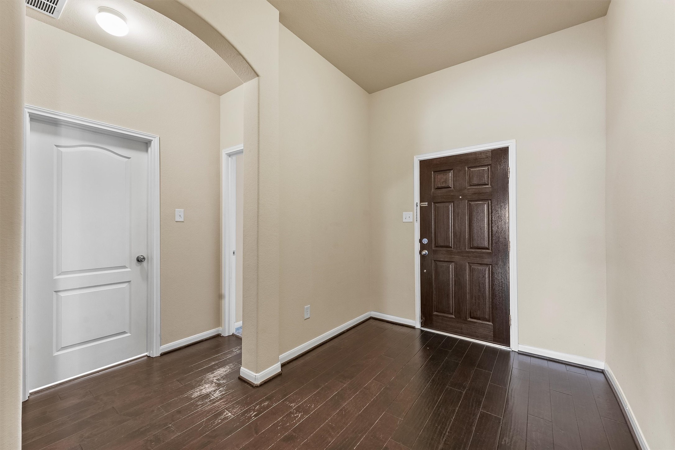 3841 Enchanted Timbers Lane Spring, TX 77386 - Photo 5 of 28 a view of wooden floor and windows in a room