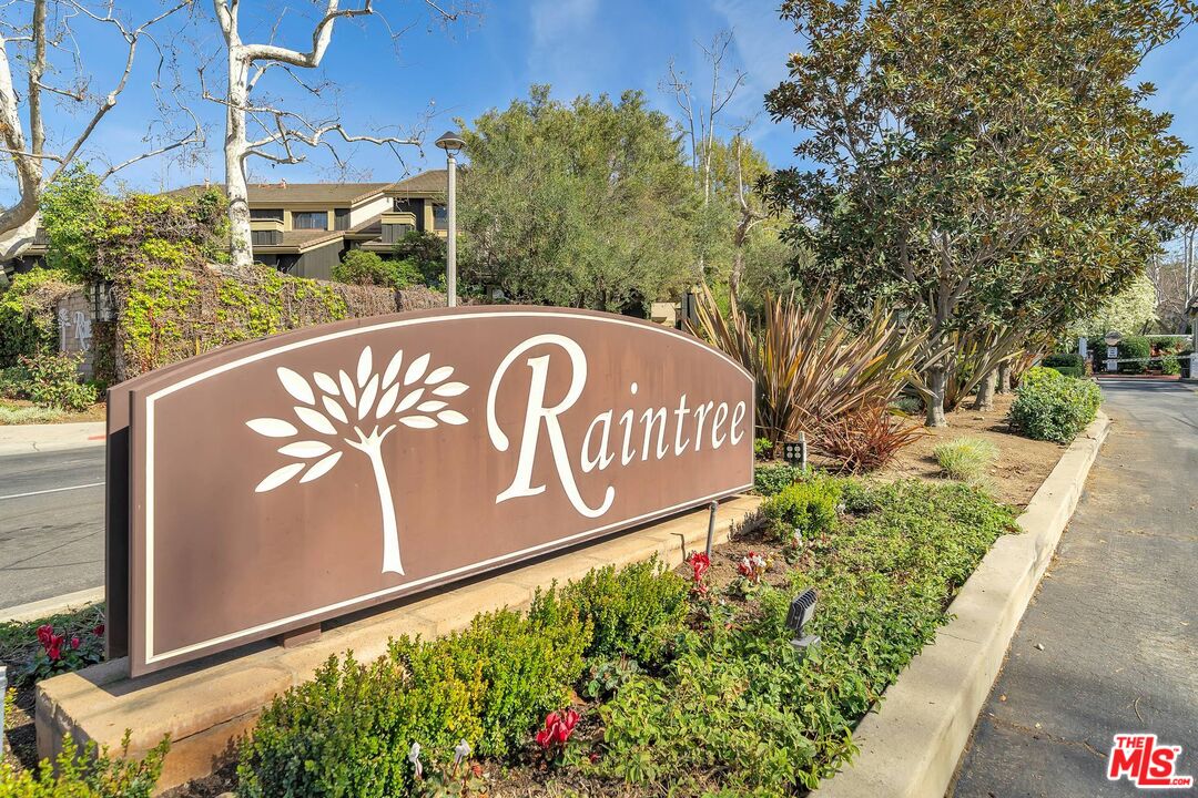 a sign that is on a brick wall