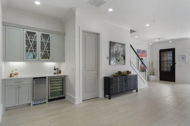 a room with furniture and stairs