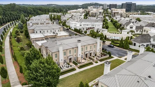 an aerial view of a house with a ocean view