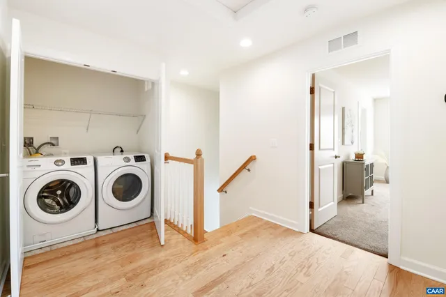 a view of a storage & utility room with washer and dryer