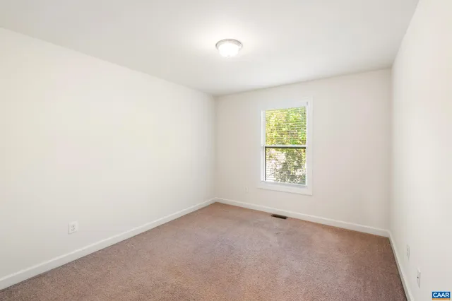 an empty room with window