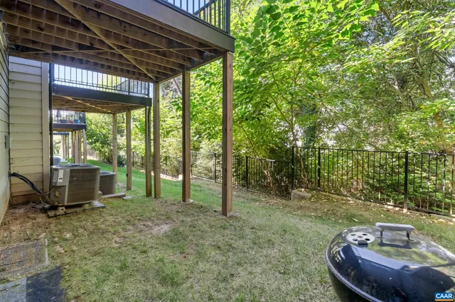 a view of backyard with cabin