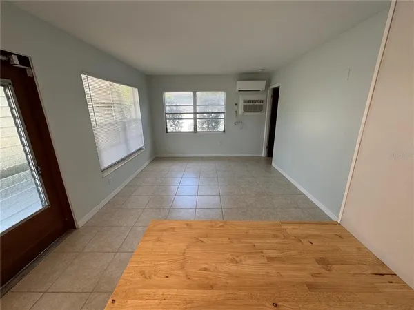 a view of hallway with windows