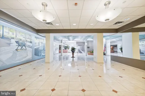 a room with gym equipment and a window