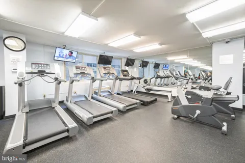 a view of a house with a tree
