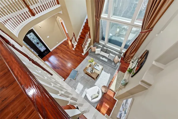 a view of an entryway with wooden floor