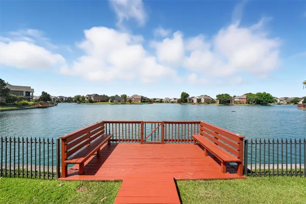a garden view with a seating space and hardwood floor