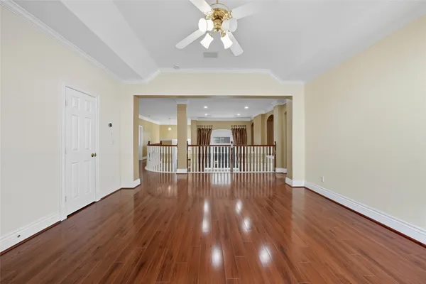 a front view of a house with swimming pool having outdoor seating