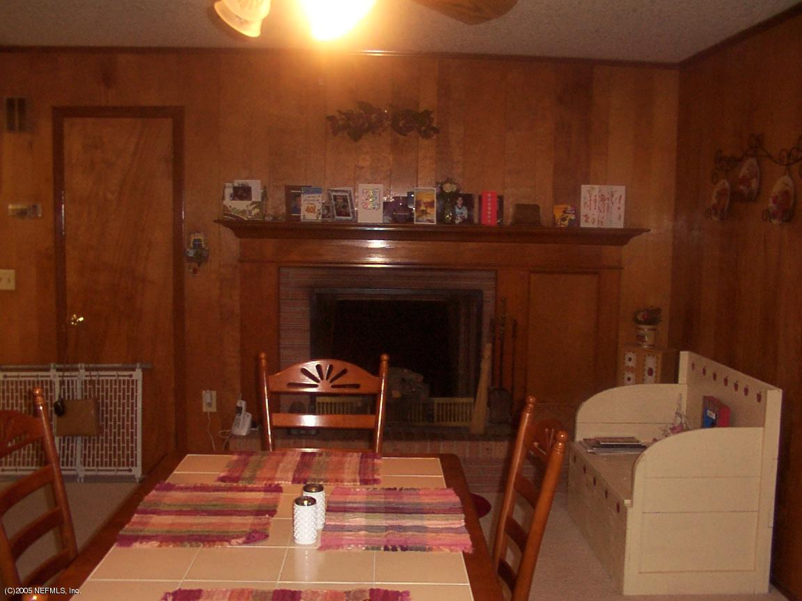 2631 Elbow Road Orange Park, FL 32073 - Photo 8 of 11 BREAKFAST NOOK W/ GAS FIREPLACE