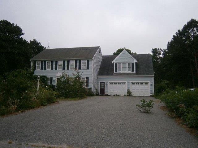 93 Dover Road Mashpee, MA 02649 - Photo 21 of 21 a front view of a house with garden