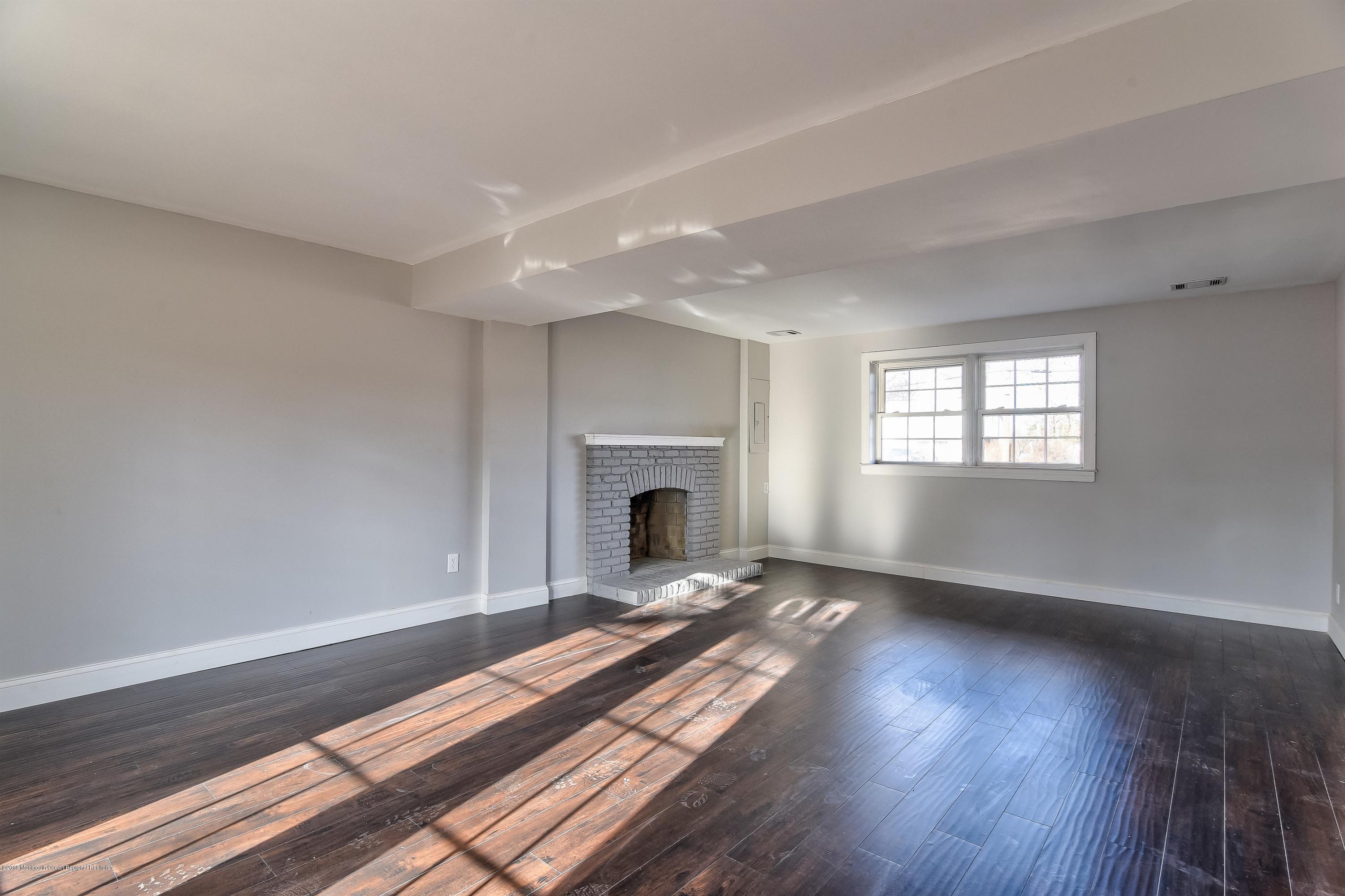 110 Greymoor Road Howell, NJ 07731 - Photo 17 of 26 family room without furniture
