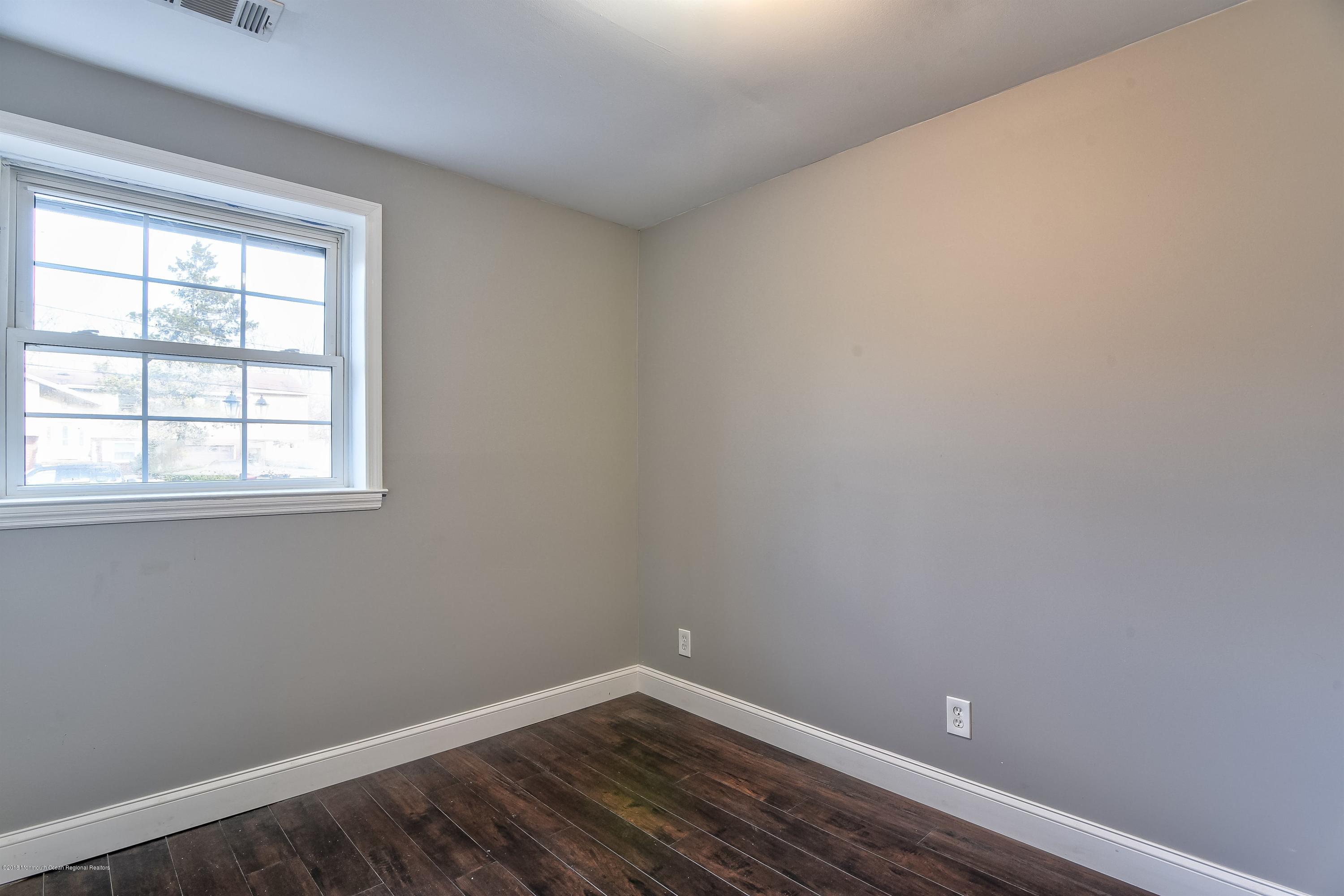 110 Greymoor Road Howell, NJ 07731 - Photo 22 of 26 down stairs bedroom