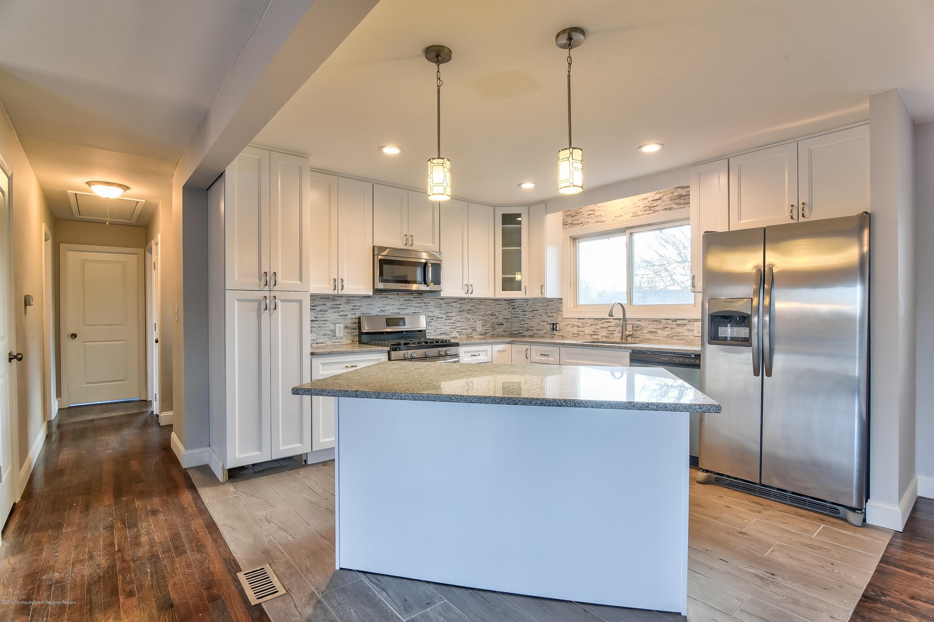 110 Greymoor Road Howell, NJ 07731 - Photo 8 of 26 kitchen facing island